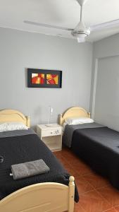 Ένα ή περισσότερα κρεβάτια σε δωμάτιο στο Alto Padilla Apartment