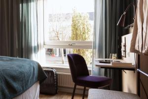 Ліжко або ліжка в номері Scandic Aalborg Øst
