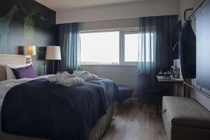 Ліжко або ліжка в номері Scandic Aalborg Øst