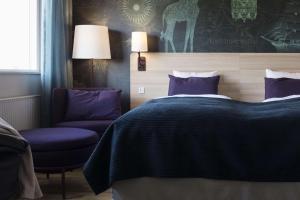 Ліжко або ліжка в номері Scandic Aalborg Øst
