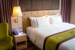 Letto o letti in una camera di The Bazaar Hotel Bangkok