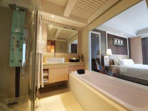 Letto o letti in una camera di The Bazaar Hotel Bangkok