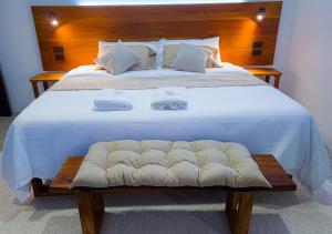 Postel nebo postele na pokoji v ubytování Coral Apartments