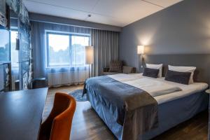Ένα ή περισσότερα κρεβάτια σε δωμάτιο στο Scandic Kolding