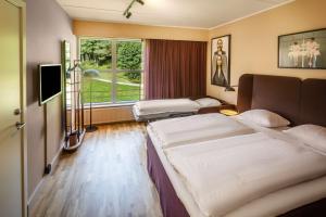 Katil atau katil-katil dalam bilik di Scandic Silkeborg