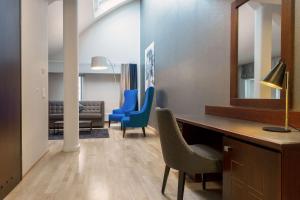 Coin salon dans l'établissement Scandic Grand Marina