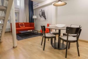 Coin salon dans l'établissement Scandic Grand Marina