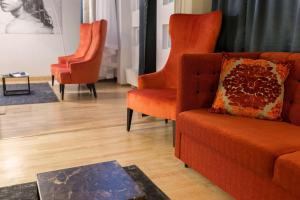 Coin salon dans l'établissement Scandic Grand Marina
