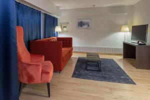 Coin salon dans l'établissement Scandic Grand Marina