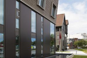 a building with large windows on the side of it at Scandic Stavanger City in Stavanger
