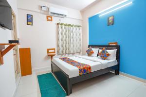 Postel nebo postele na pokoji v ubytování Via La Palma Residency - Bellandur