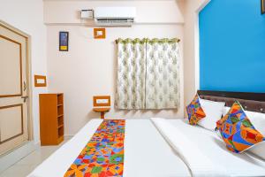 Postel nebo postele na pokoji v ubytování Via La Palma Residency - Bellandur + 21 fotografií