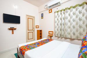 Postel nebo postele na pokoji v ubytování Via La Palma Residency - Bellandur