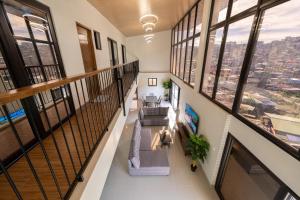 a view from the top of a building with windows at The Warehouse Loft in Baguio