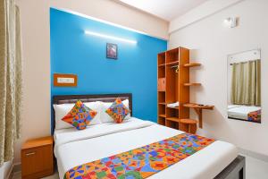 Postel nebo postele na pokoji v ubytování Via La Palma Residency - Bellandur