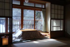 Una cama o camas en una habitación de 清浄心院