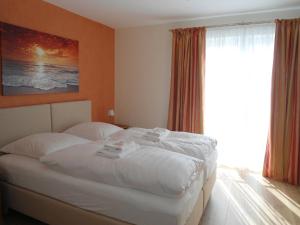 Postel nebo postele na pokoji v ubytování Seehotel Lönö
