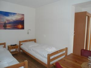 Postel nebo postele na pokoji v ubytování Seehotel Lönö