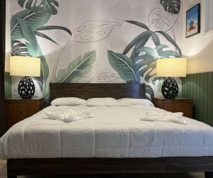 Voodi või voodid majutusasutuse Wild Ginger Hotel toas