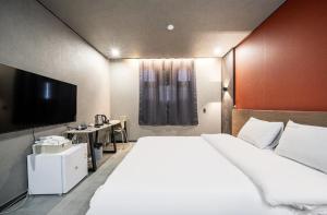 TV a/nebo společenská místnost v ubytování Moonstay Hotel Cheonan