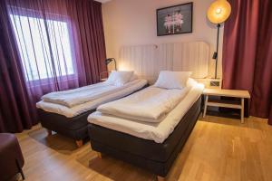 Postel nebo postele na pokoji v ubytování Scandic Star Lund
