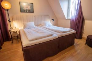 Postel nebo postele na pokoji v ubytování Scandic Star Lund