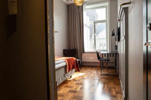 Postel nebo postele na pokoji v ubytování Scandic Grand Central