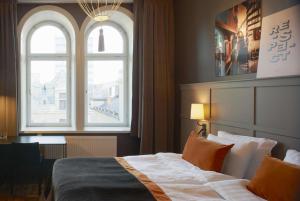 Postel nebo postele na pokoji v ubytování Scandic Grand Central