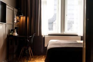Postel nebo postele na pokoji v ubytování Scandic Grand Central