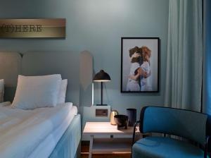 A bed or beds in a room at Scandic Klara