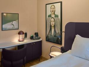 A bed or beds in a room at Scandic Klara