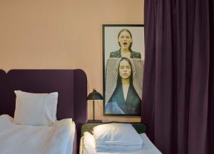 A bed or beds in a room at Scandic Klara