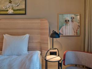 A bed or beds in a room at Scandic Klara