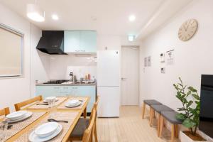 Kuchyň nebo kuchyňský kout v ubytování 夢の宿 翼 132t