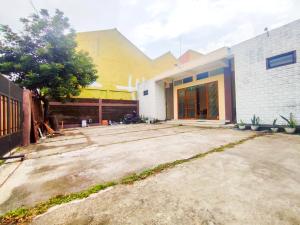 a house that is being remodeled at Griya Poerwoto Syariah near Pasar Klewer Solo RedPartner in Solo