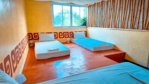 Postel nebo postele na pokoji v ubytování Palacio Hostel