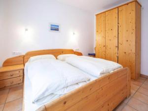 Posteľ alebo postele v izbe v ubytovaní Chalet in Filzsteinalpe near Ski Slopes