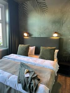 Letto o letti in una camera di Hotell Onyxen, boutique- & lifestyle, Adults Only