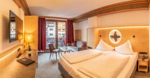 Voodi või voodid majutusasutuse Hotel Tyrol am Haldensee toas