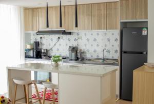 Kuchyň nebo kuchyňský kout v ubytování Laurel Hill Suites