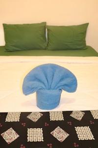 Postel nebo postele na pokoji v ubytování Ijen & Sleep Homestay