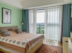 Postel nebo postele na pokoji v ubytování Laurel Hill Suites