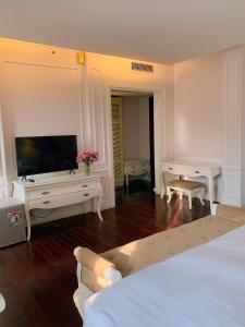 Postelja oz. postelje v sobi nastanitve Ha Noi Memory Central Hotel And Spa