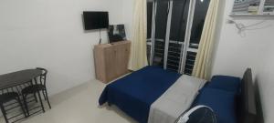 TV a/nebo společenská místnost v ubytování Studio Condo Modena Town Square Minglanilla