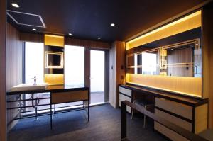 a bathroom with a sink and a mirror at Susukino LOVE HOTEL1-Adult Only in Sapporo +16 photos
