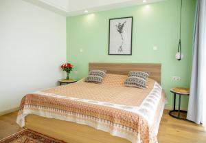 Postel nebo postele na pokoji v ubytování Laurel Hill Suites