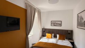 Voodi või voodid majutusasutuse Hotel Tynec toas