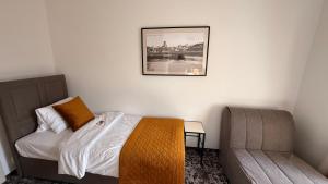 Voodi või voodid majutusasutuse Hotel Tynec toas