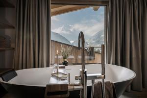 Fotografie z fotogalerie ubytování BRUGGER ApartHotel v Mayrhofenu + 37 fotografií