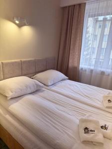 Posteľ alebo postele v izbe v ubytovaní Hotel TM